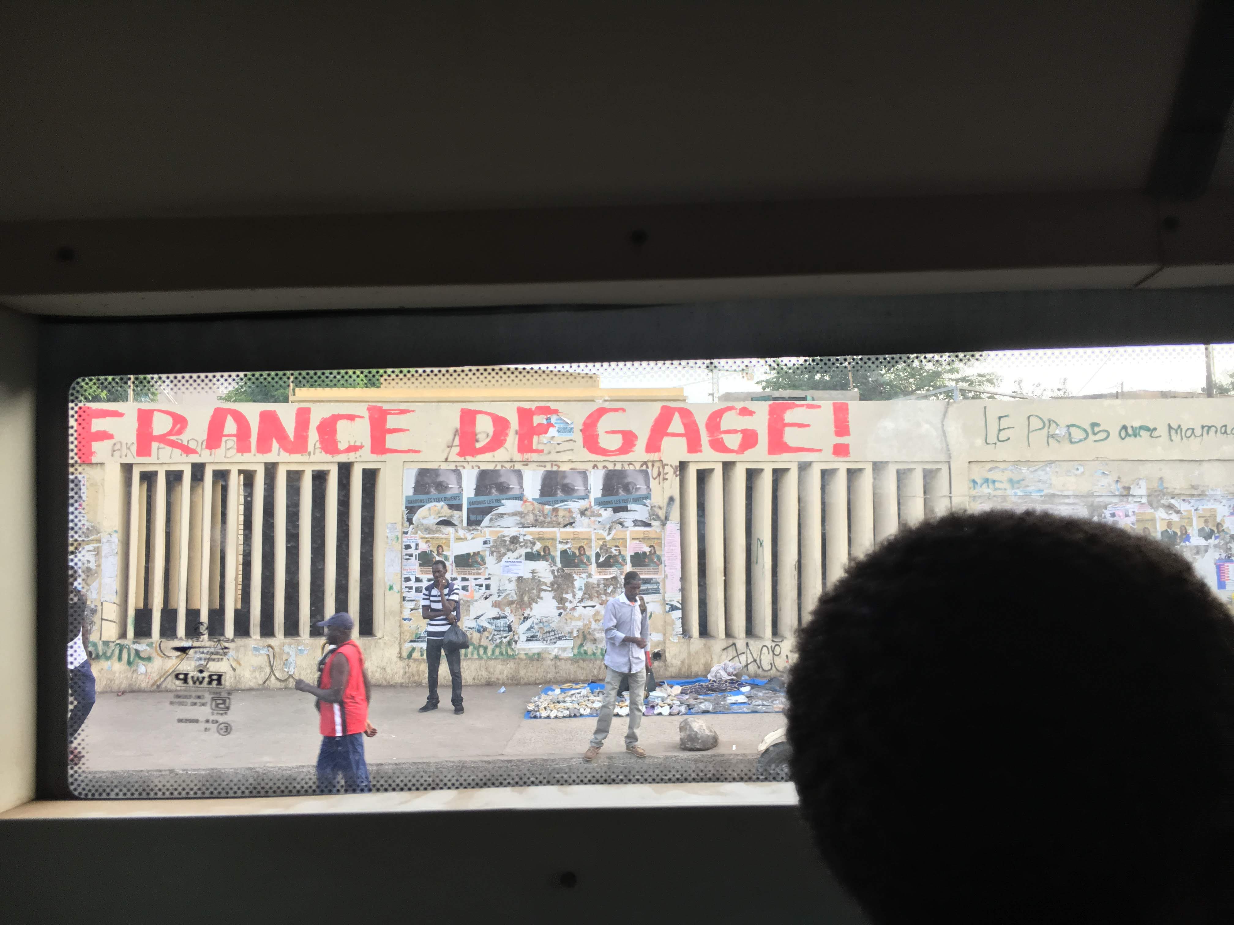 dakar senegal political graffiti france degage